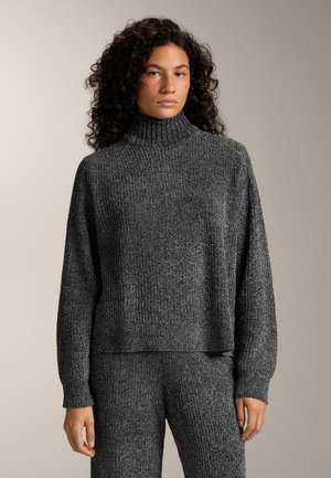 Gray ribbed turtleneck sweater made of textured knit fabric, featuring long sleeves and a relaxed fit, paired with matching bottom.