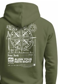 Olive green hoodie featuring a white compass graphic with intricate design, sun illustration, and text reading "Point North" and "ALIGN YOUR PATH RIGHT."