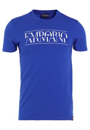 Sininen lyhythihainen t-paita, jossa valkoinen vääristynyt ""EMPORIO ARMANI""-teksti ja logo keskellä rintaa.