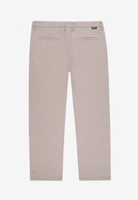 Jasnobeżowe spodnie wykonane z bawełny. Posiadają dwie tylne kieszenie, zapięcie na guzik oraz proste nogawki z czystymi brzegami.