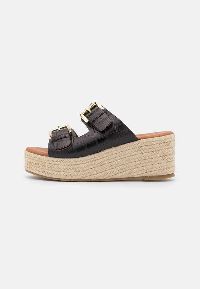 Slip-ins med klack - black monterey