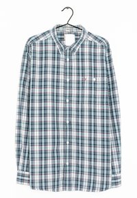 Camicia a maniche lunghe a quadri in blu, bianco e rosso. Presenta una chiusura con bottoni, colletto e taschino sul petto. Realizzata in tessuto leggero.