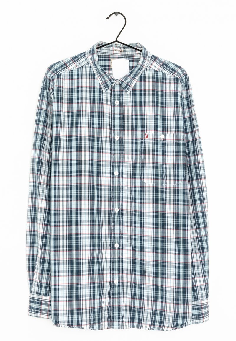 Camicia a maniche lunghe a quadri in blu, bianco e rosso. Presenta una chiusura con bottoni, colletto e taschino sul petto. Realizzata in tessuto leggero.