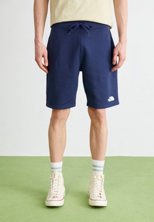 STANDARD - Tracksuit bottoms - summit navy