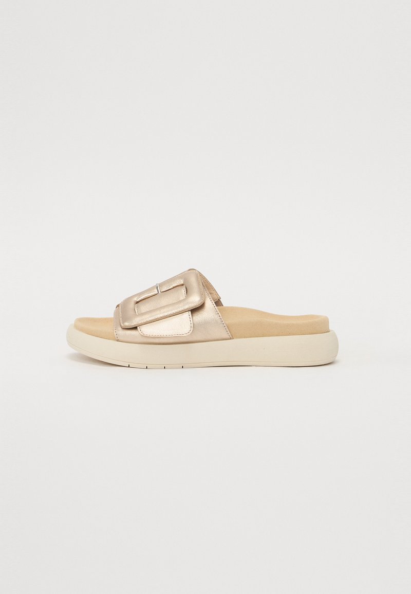 Metallic gold slide sandal with a thick strap featuring a rectangular buckle, cushioned beige footbed, and a white rubber sole.