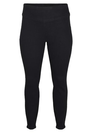 Zwarte legging met een hoge tailleband, slanke pasvorm en rekbare stof. Het ontwerp is naadloos zonder zichtbare sluitingen of patronen.