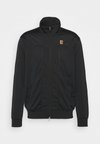 HERITAGE - Chaqueta de entrenamiento - black