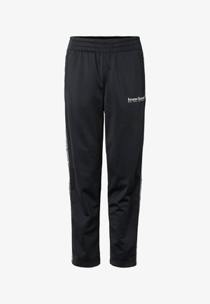 Pantalon de sport noir avec taille élastique, poches latérales, logo blanc « bruno banani » sur la cuisse droite, et bandes de marque le long des jambes.