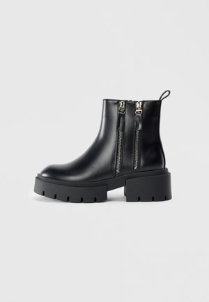 Platform ankle boots - black