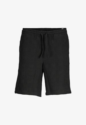 Pantalones cortos negros de tela texturizada, con una cintura elástica y cordón ajustable, y una superficie estampada.