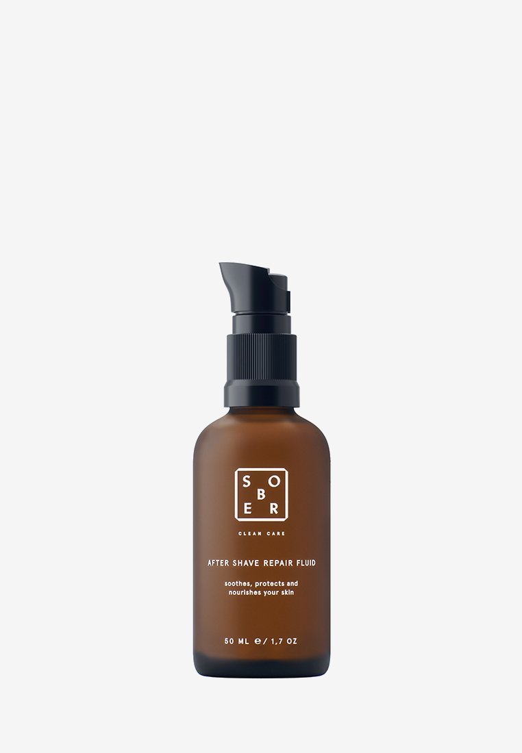 Brown glass bottle of Sobor After Shave Repair Fluid with black pump dispenser, labeled to soothe, protect, and nourish skin, 50 ml capacity.
