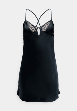 Zwart slipdress met verstelbare dunne schouderbanden, voorzien van een v-halslijn en een kanten inzetstuk met geometrische patronen bij de buste. Zijdezachte textuur.