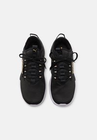 Puma Chaussures de running sur route - gold-coloured