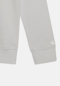 Calvin Klein Jeans LOGO REGULAR UNISEX - Felpa - lunar rock