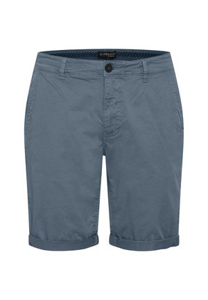 Svetlomodré bavlnené šortky s manžetami, so zipsom a jedným gombíkom na zapínanie. Obsahujú bočné vrecká a pás so značkovým logom.