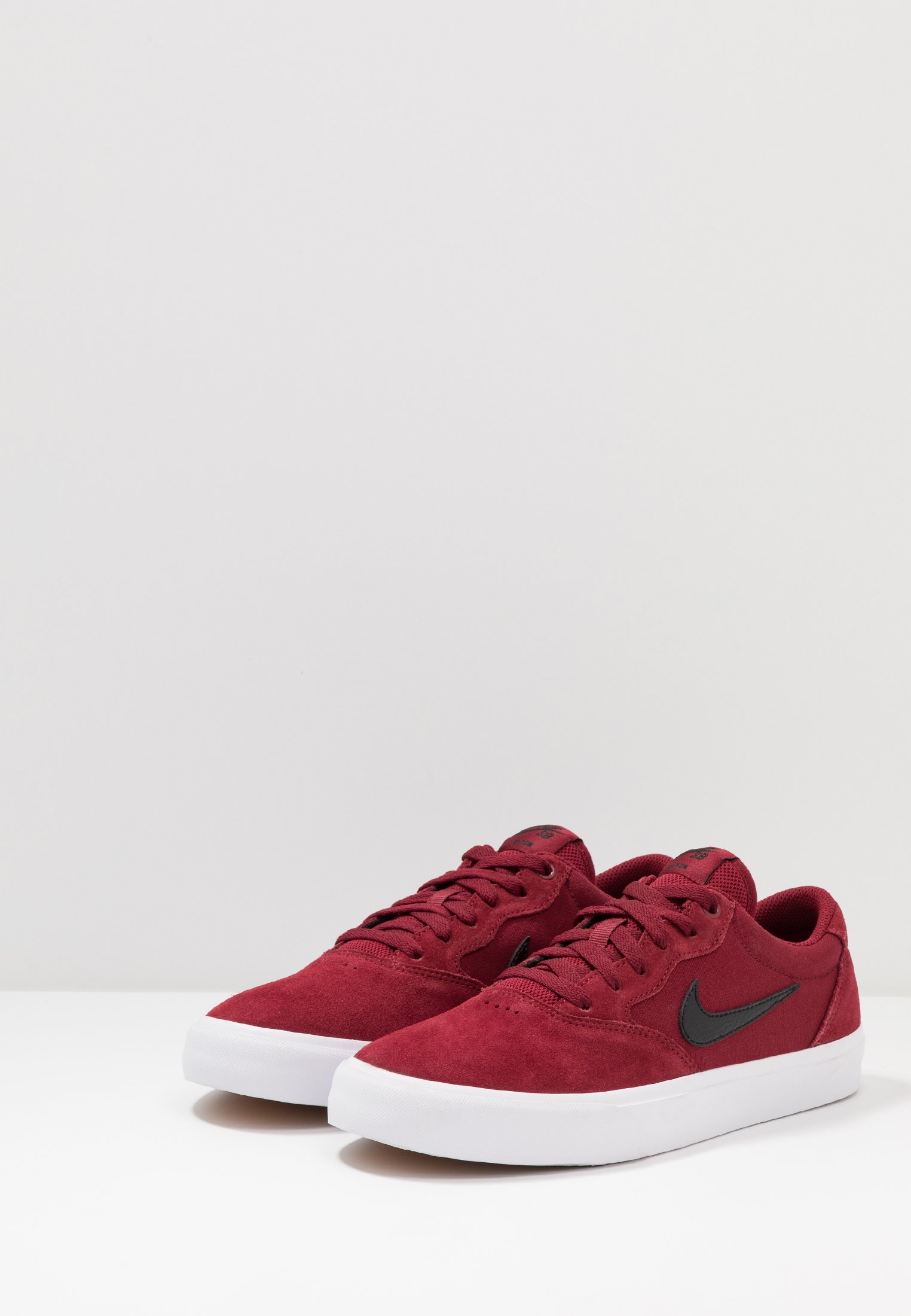 dark red nike trainers