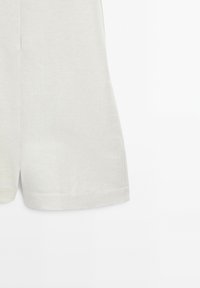 Light gray shorts made of a smooth, breathable fabric. Features a simple design with a straight cut and side pockets. No visible embellishments.