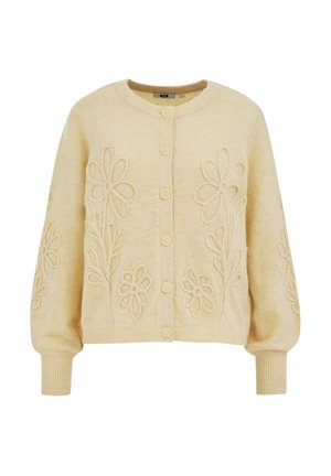 Kermanvärinen neulottu neuletakki, jossa edessä napit ja kohotettu kukkaommel rinnassa ja hihoissa, resorit hupussa ja helmassa.