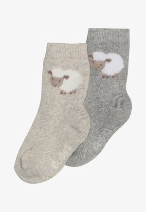 To sæt strikkede sokker: et beige sæt med et fåre mønster og et gråt sæt med et lignende design. Blød tekstur, ribbede manchetter, ankel længde.