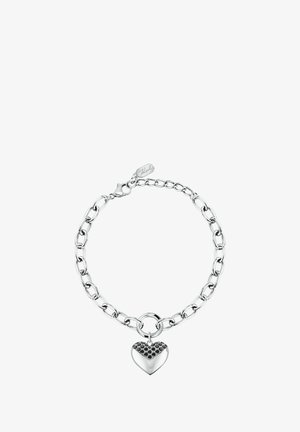 Braccialetto a catena d'argento con maglie rotonde e un ciondolo a forma di cuore con motivo a nido d'ape nella metà superiore.