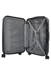 Valigia rigida nera con interni grigi, diversi scomparti in rete e con zip, cinghie di compressione e quattro ruote piroettanti per una facile manovrabilità.