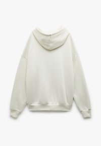 Weißer Kapuzenpullover mit lockerer Passform, weicher Textur und gerippten Bündchen. Verfügt über eine Kängurutasche und ein glattes Kapuzendesign.