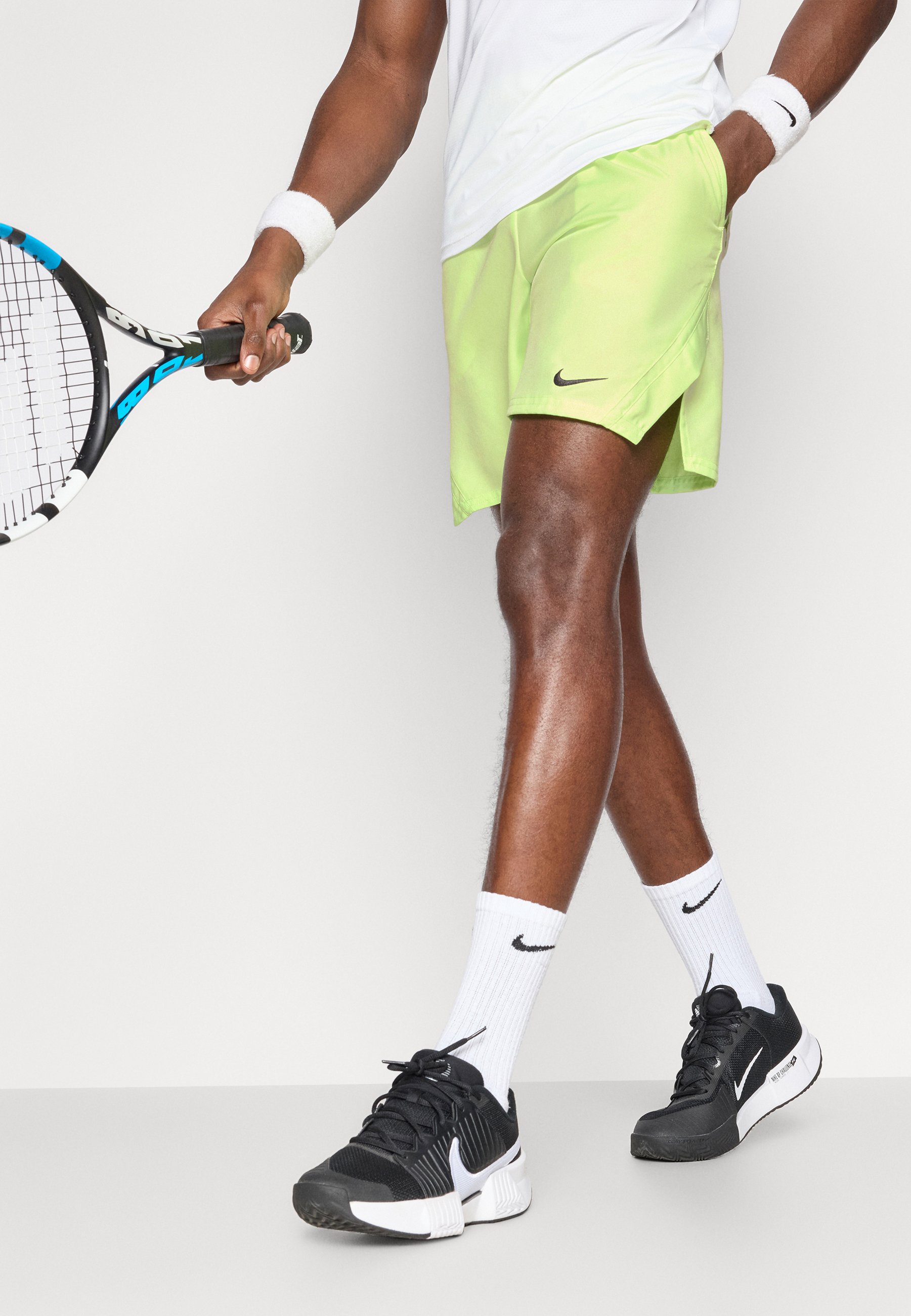 lime green and black nike shorts