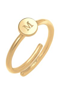 Anello regolabile in oro 18 carati con un disco circolare inciso con una "M", linee morbide e finitura lucida. Marcato "925" per garantire la qualità.