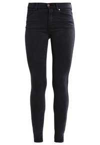 Schwarze Skinny Jeans aus dunkel gefärbtem Denim mit glatter Oberfläche, ausgestattet mit einem Knopfverschluss und einem Fünf-Taschen-Design. Nähte in passendem Faden.