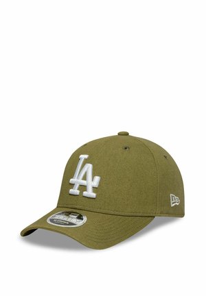 Olive green LA baseball cap with white embroidered logo and curved brim, viewed at slight angle on white background.