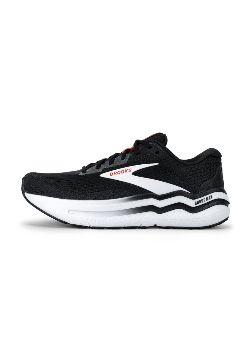 Chaussure de course noire avec tige en mesh, semelle blanche et noire, et accents distinctifs gris et rouge. Dispose d'un intercalaire rembourré pour le soutien.