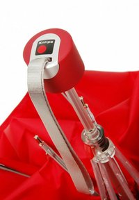Knirps umbrella with a red canopy, silver hardware, and a gray strap. Notable features include transparent ribs and a compact design.