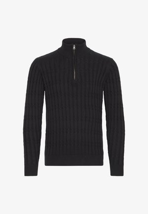 Mustana neulepaita korkealla kauluksella ja neljännesvetoketjulla. Siinä on teksturoitu ribbi-malli ja pitkät hihat. Yksinkertainen ja istuva muotoilu.