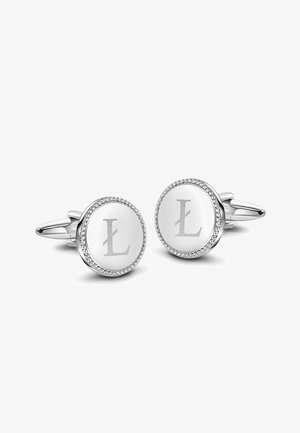 Cufflinks w srebrnym wykończeniu o okrągłym kształcie, z polerowaną powierzchnią i wygrawerowanym 'L', otoczone teksturowaną ramką z małymi akcentami.