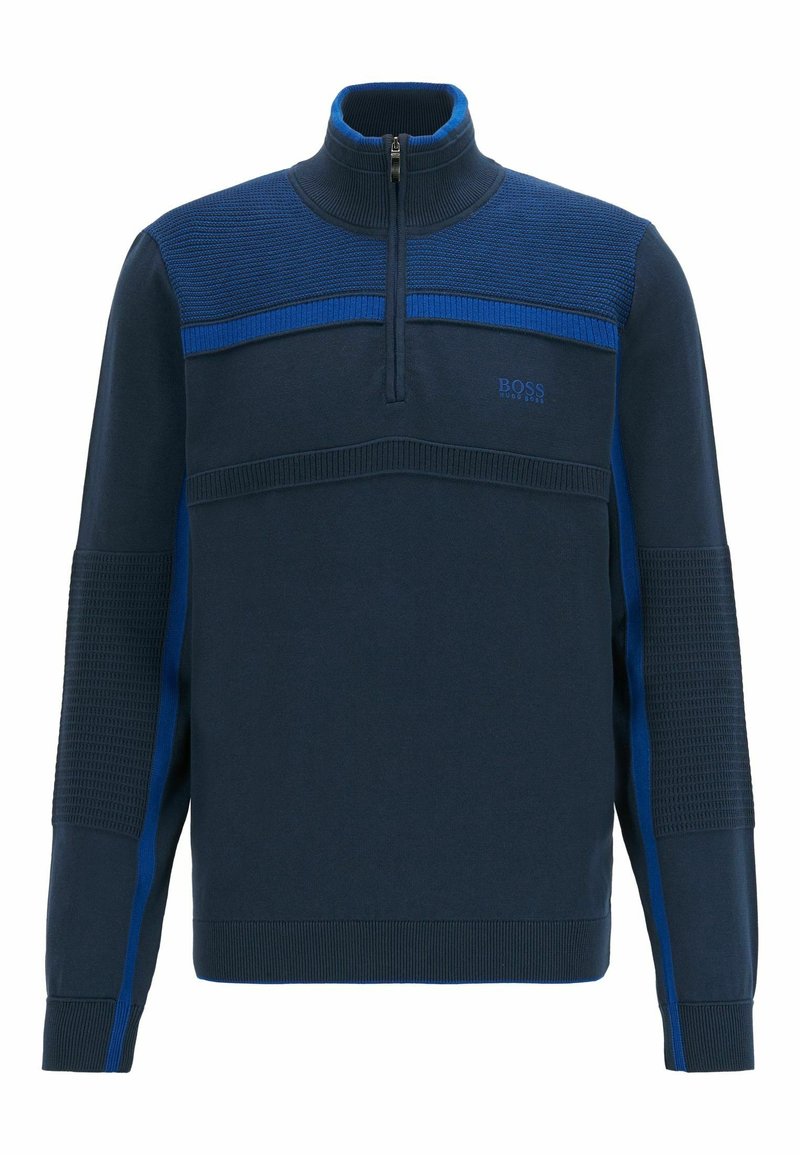 Mörkblå tröja med hög krage, med en halvdragkedja, strukturerad tyg på axlarna och kontrasterande blå detaljer på sidorna.