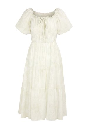 Robe midi beige clair avec manches courtes bouffantes, corsage froncé, encolure à nouer et jupe évasée. Design simple, léger et estival.