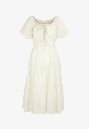 Robe midi beige clair avec manches courtes bouffantes, corsage froncé, encolure à nouer et jupe évasée. Design simple, léger et estival.