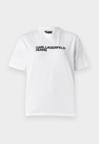 Vit bomullst-shirt med svart tryckt logotyp "KARL LAGERFELD JEANS" över bröstet, rund halsringning och korta ärmar.