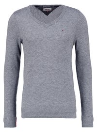 Grau melierter V-Ausschnitt-Pullover aus weichem Strickstoff. Mit langen Ärmeln und einem kleinen Logo-Emblem auf der Brust. Rippbündchen und -saum.