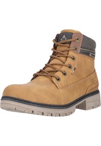 Bruna läderankelskor med vadderat krage, förstärkta ögla och en texturerad gummisula med djup mönstring för bra grepp.