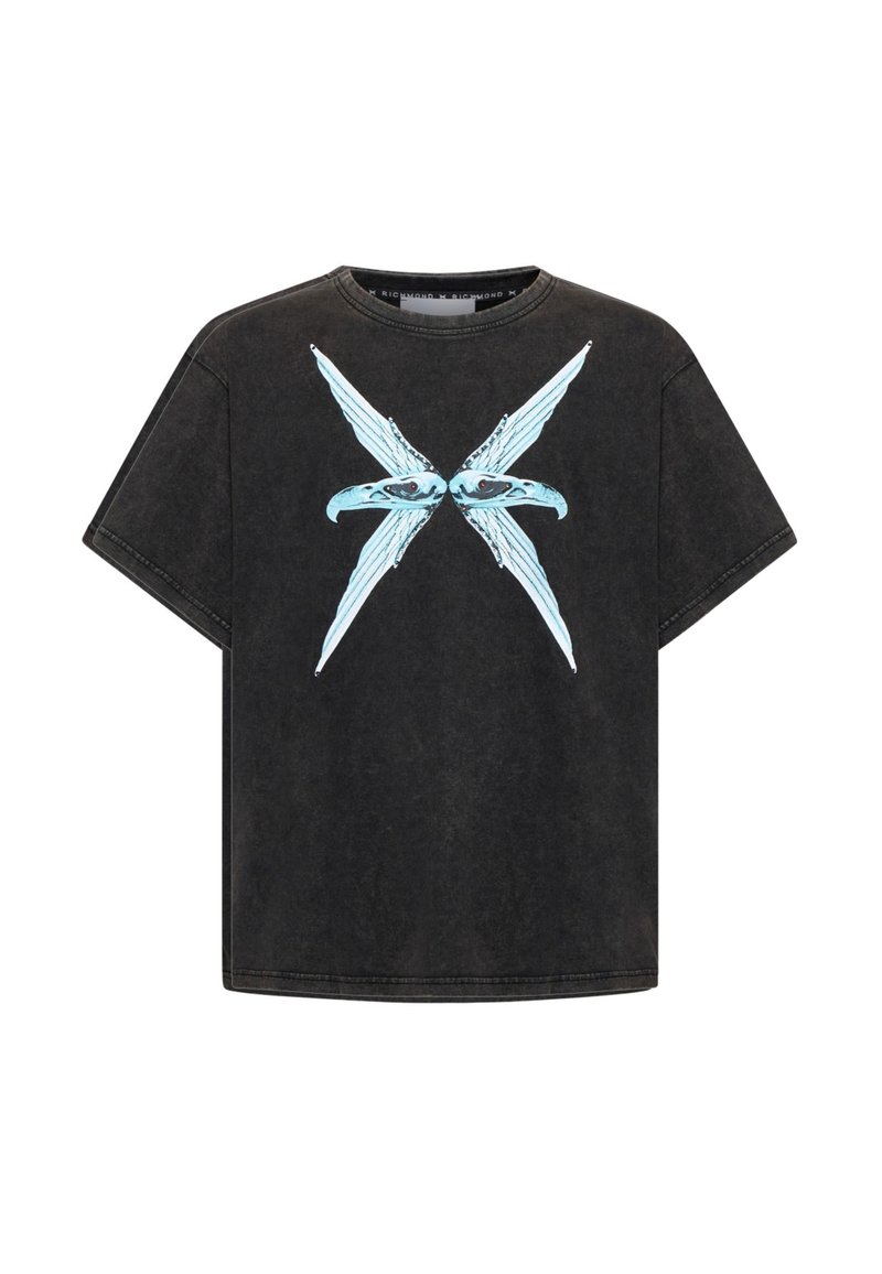 T-shirt nera oversize in cotone, con un design grafico blu di ali incrociate e occhi sul davanti. Maniche corte, collo rotondo.