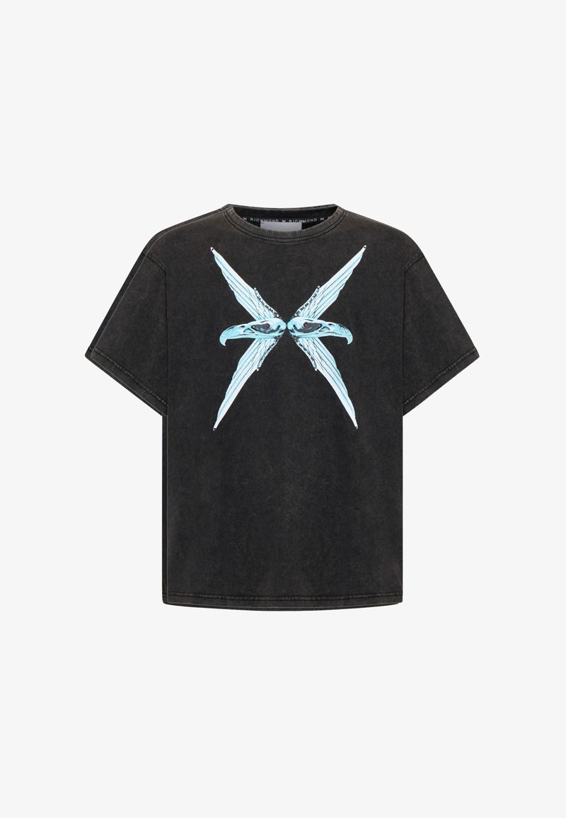 T-shirt nera oversize in cotone, con un design grafico blu di ali incrociate e occhi sul davanti. Maniche corte, collo rotondo.