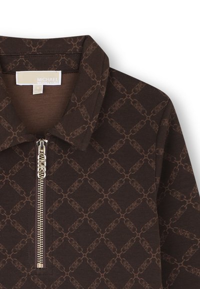 Brown zip-up top featuring a geometric logo pattern in a darker shade, with a collared neckline and silver hardware.