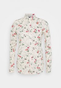 Langärmliges Hemd aus cremefarbenem Stoff, mit einem floralen Muster in Pink- und Grüntönen. Knopfverschluss vorne mit spitzem Kragen.