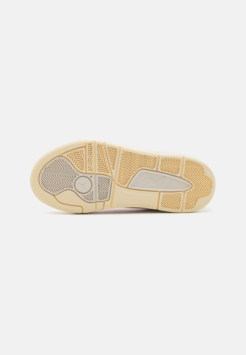 Semelle en caoutchouc avec un motif de traction en zigzag, de couleur crème avec des accents gris clair. Surface lisse avec un bout arrondi.