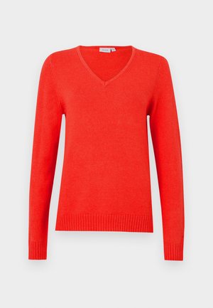 Camisola vermelha com decote em bico, mangas compridas, punhos e barra canelados, feita de material macio, com textura clássica de malha e linhas limpas.