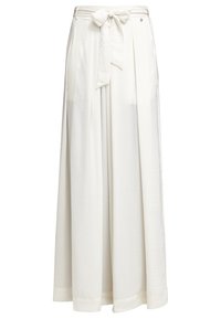 Bílé široké kalhoty vyrobené z lehké tkaniny, s páskem na zavázání v pase a jemnými sklady pro zvýšení textury.