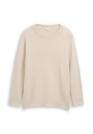 Lichtbeige trui met een gestructureerd, honingraatpatroon. Beschikt over een brede ronde halslijn en lange mouwen, met een ribbelzoom.