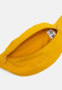 MELA HIP - Heuptas - sunflower