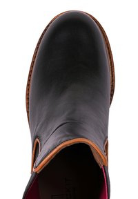 Schwarze Leder-Stiefelette mit braunen Akzenten, runder Zehenpartie, elastischen Seitenpaneelen und strukturiertem Sohlen. Das Innere verfügt über ein pinkes Futter.